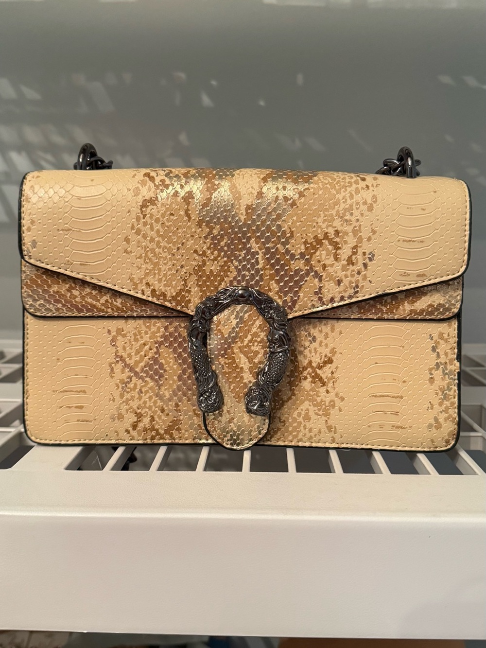 Cream Snake-Pattern Shoulder Bag with Dark Metal Horseshoe Accent